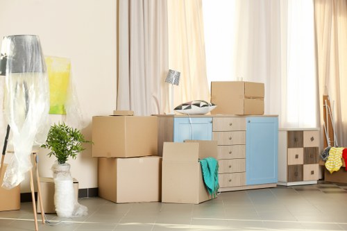 Moving boxes and furniture during a Clapham Junction removals service