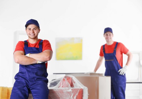 Loading household furniture into a removal van in Clapham Junction
