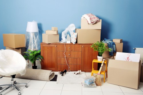 Removal van loading household items near Clapham Junction
