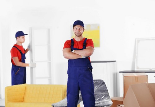 Professional packing team preparing household boxes in a Clapham Junction property