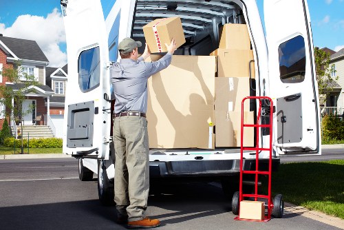 Loading household furniture into a removal truck