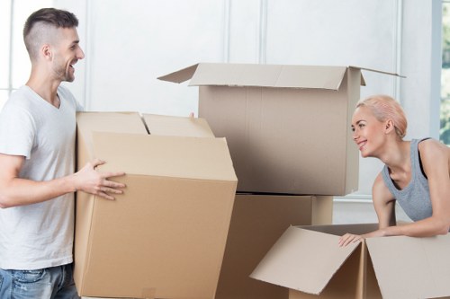 Packed office boxes and furniture ready for relocation