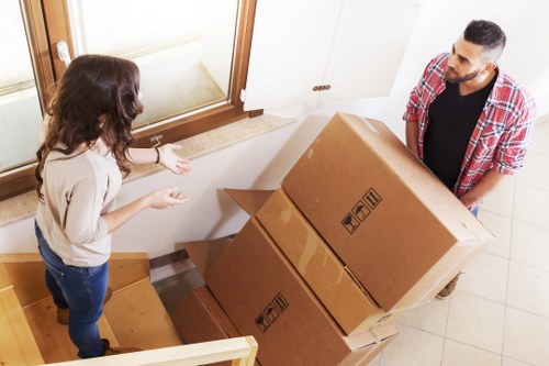 Household boxes and furniture being prepared for a local move
