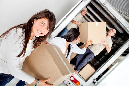 Cardboard and household items prepared for recycling during a move