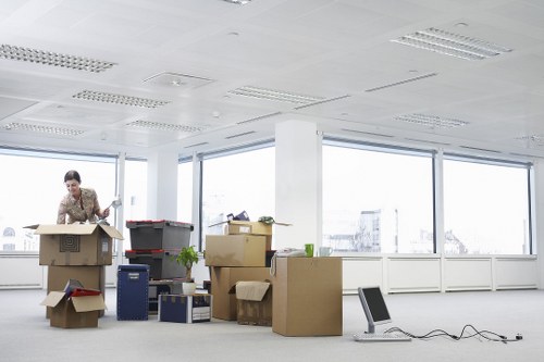 Professional movers loading furniture for a local house or flat move